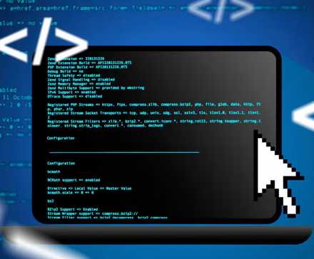 A laptop with some code on the screen and a mouse cursor.