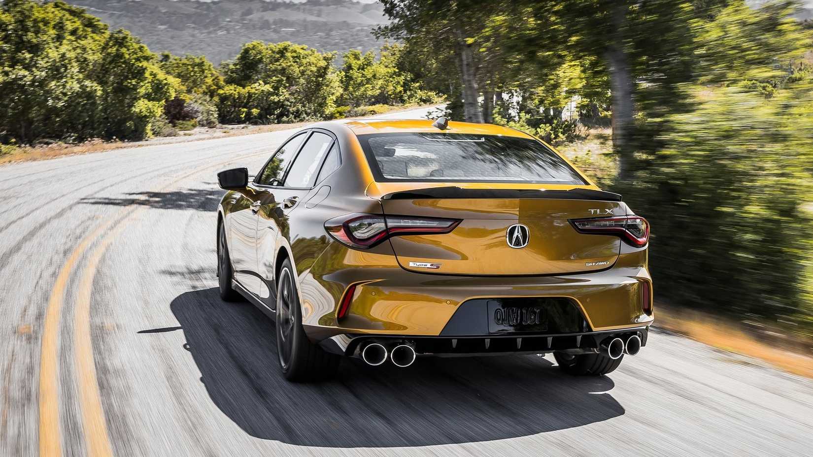 Rear 3/4 action shot of a 2021 Acura TLX Type S