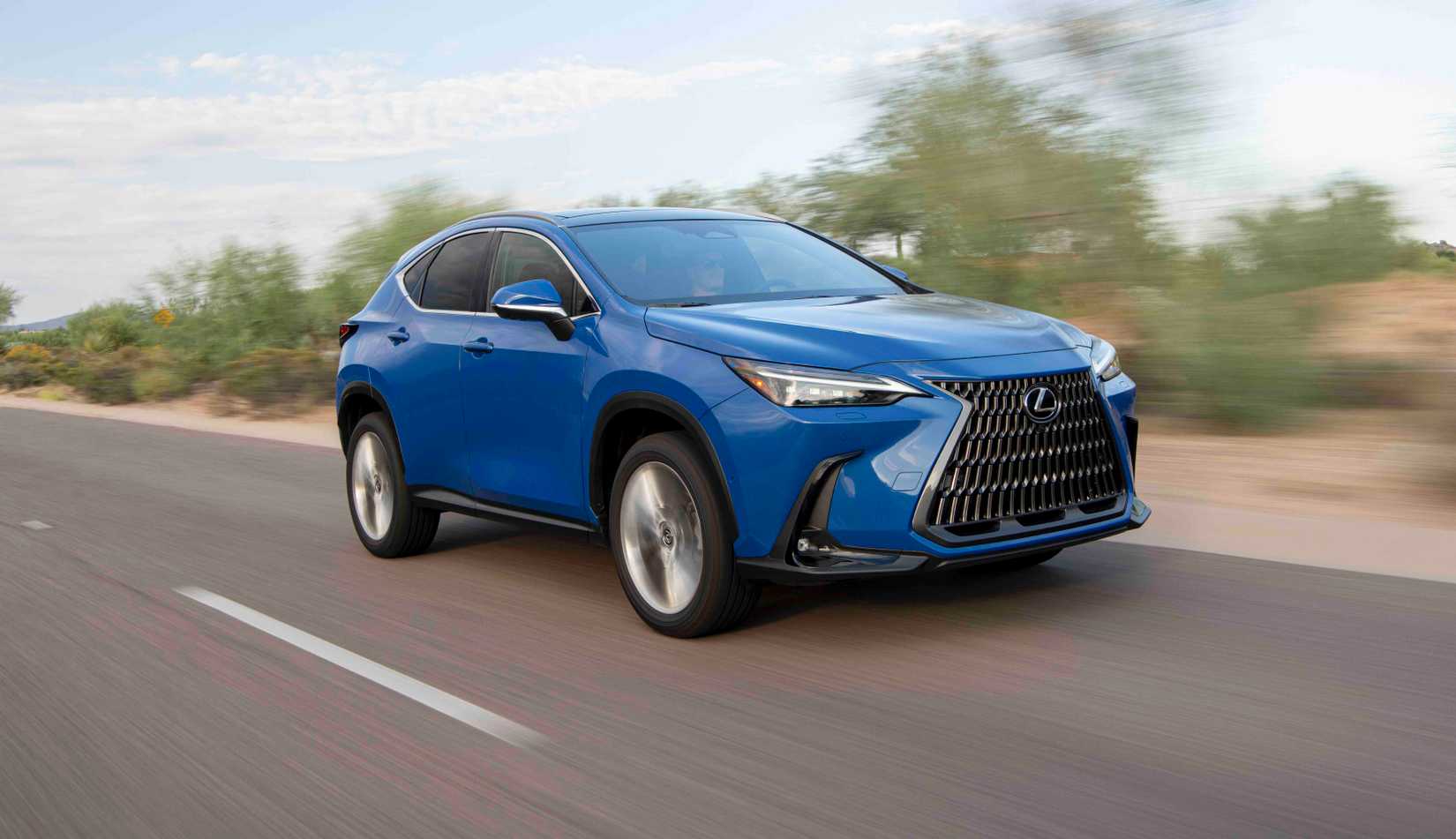 Blue 2026 Lexus NX 350h driving fast on a scenic road