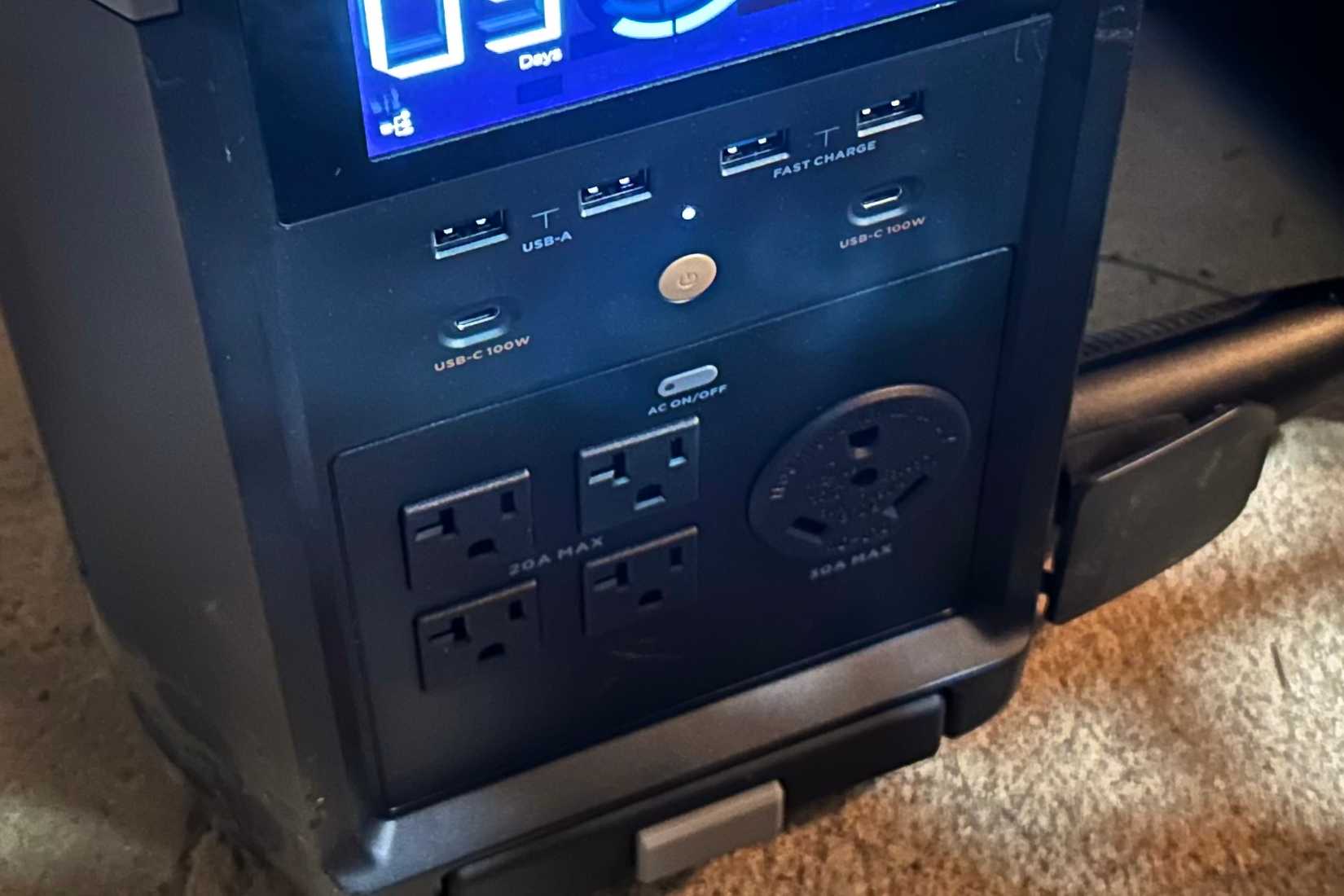 Different USB ports and various outlets on the front of an EcoFlow electric generator.