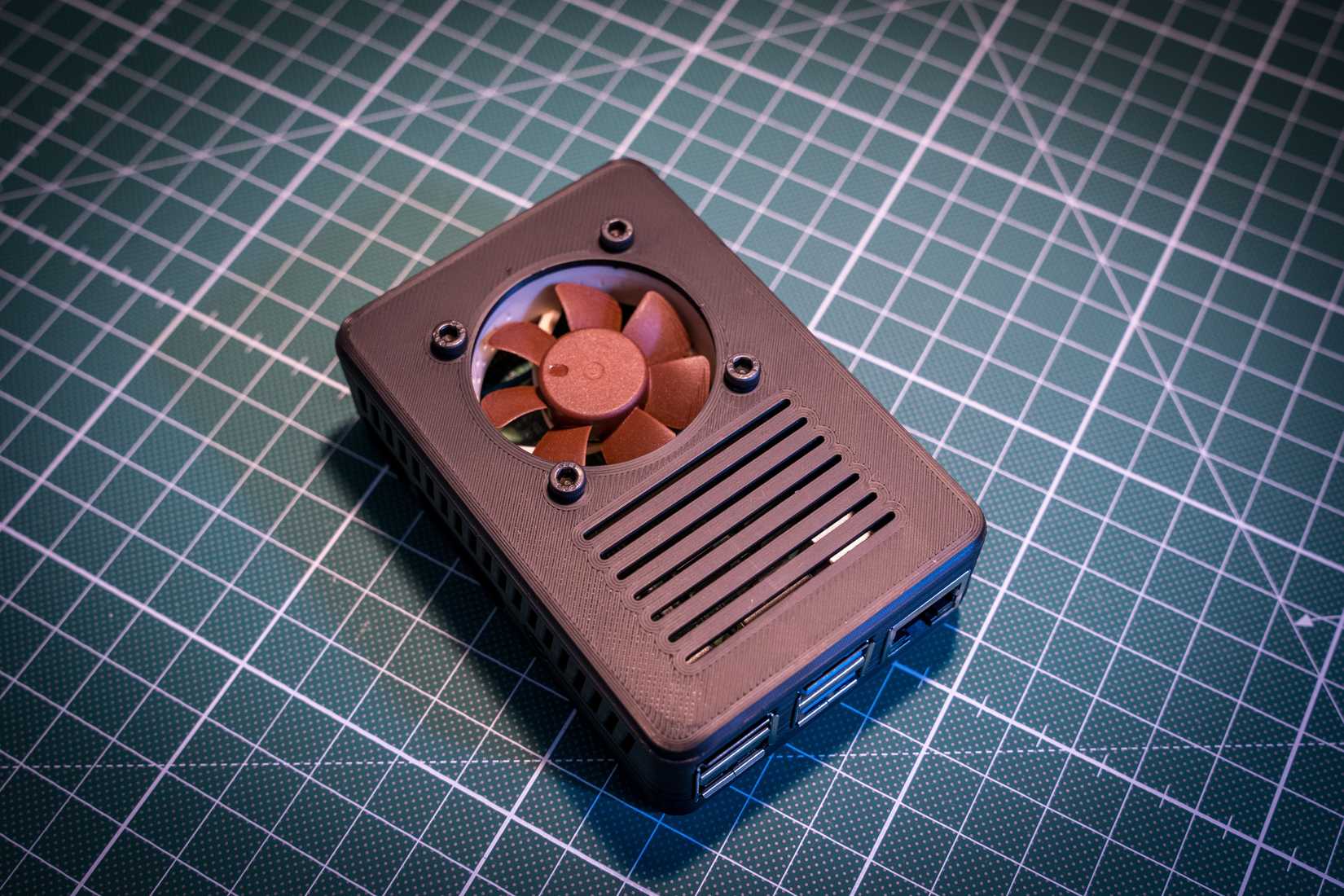 Raspberry Pi in a 3d printed case with a fan.