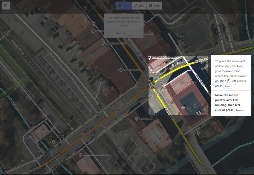 Обучающее окно редактора iD в OpenStreetMap, показывающее, как добавить интересные точки.