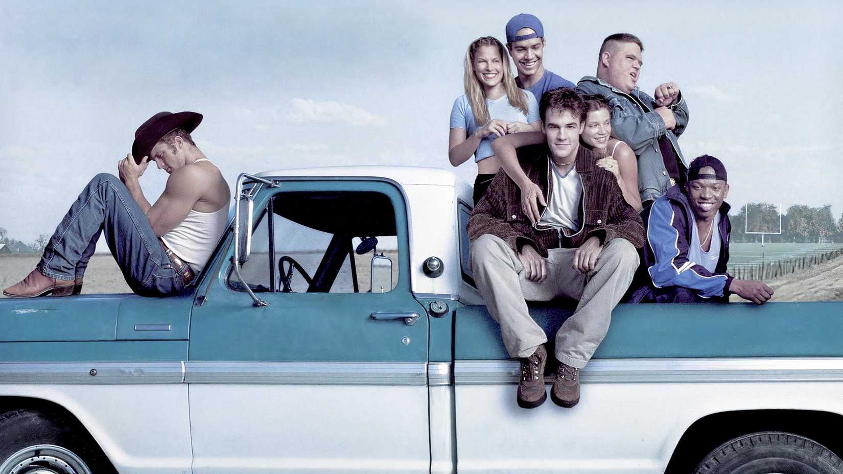 A poster of the cast of Varsity Blues.
