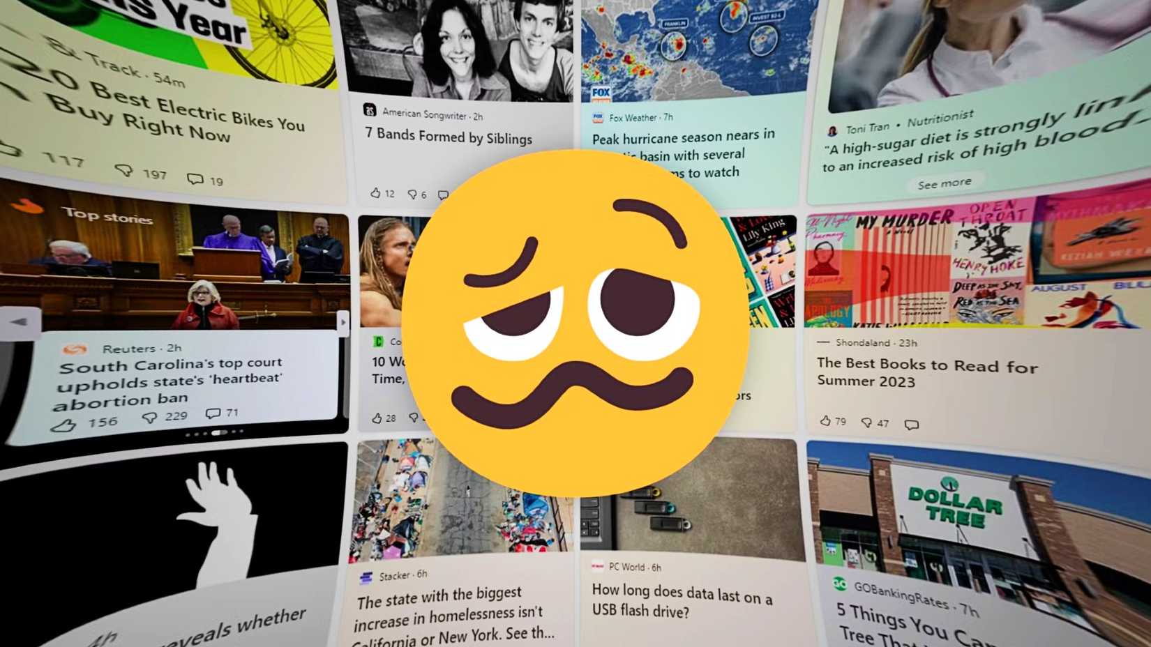 Windows 11 widgets showing news and ads behind a emoji
