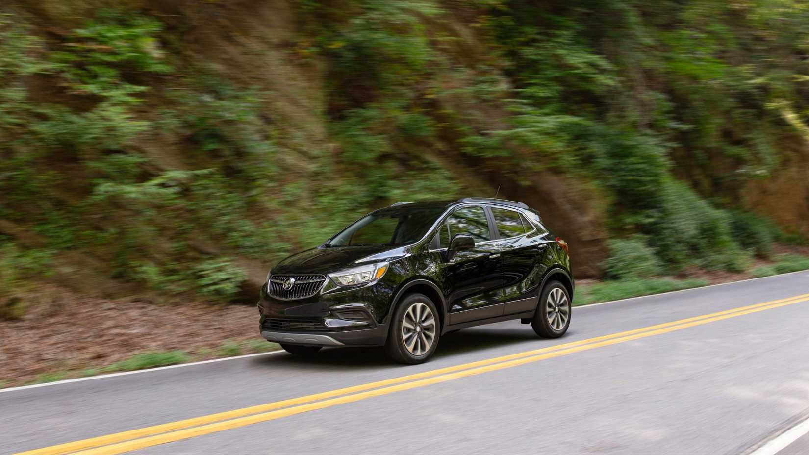 Dynamic front 3/4 shot of a black 2021 Buick Encore.
