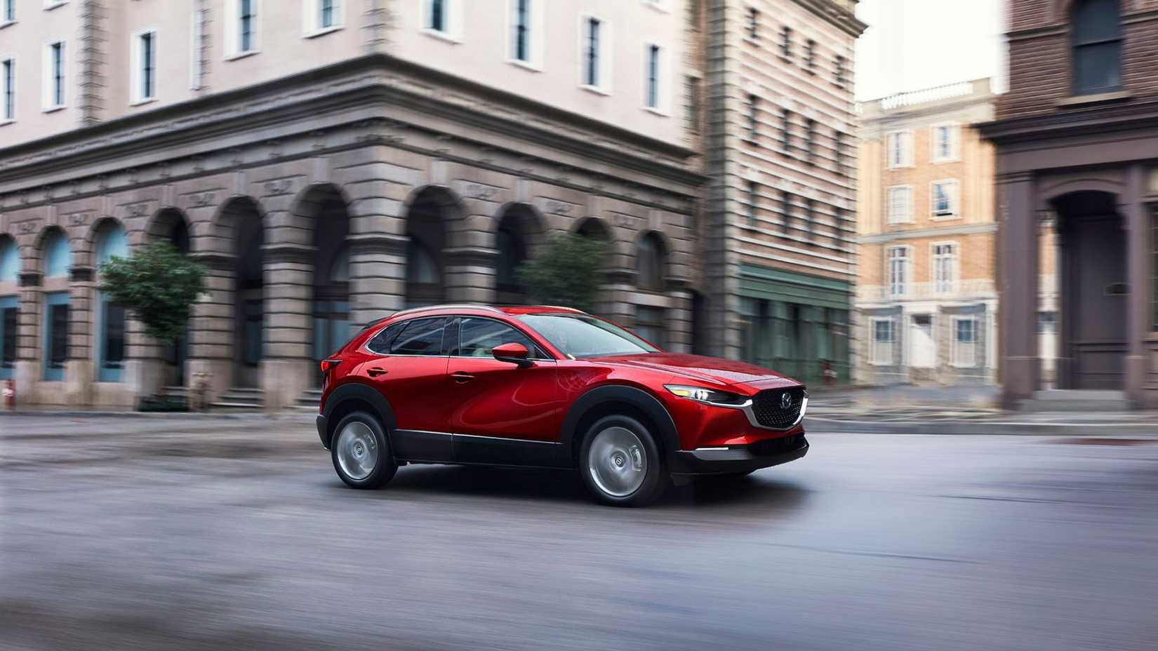 Dynamic side profile shot of a 2023 Mazda CX-30.