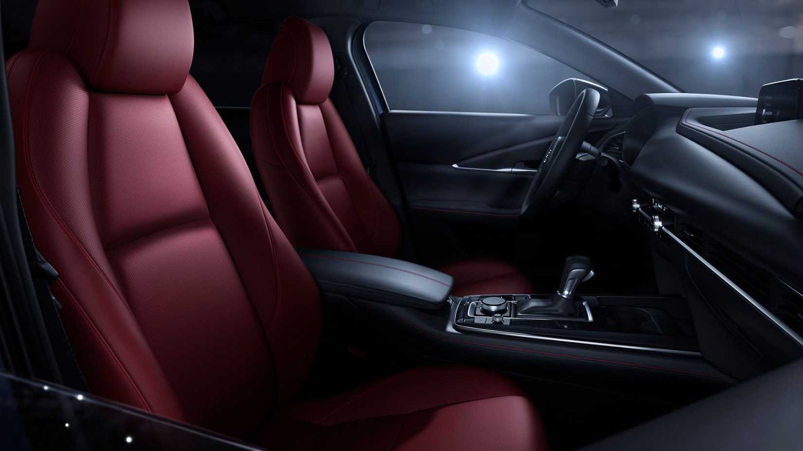 Close-up shot of the red leather interior inside the cabin of a 2023 Mazda CX-30.