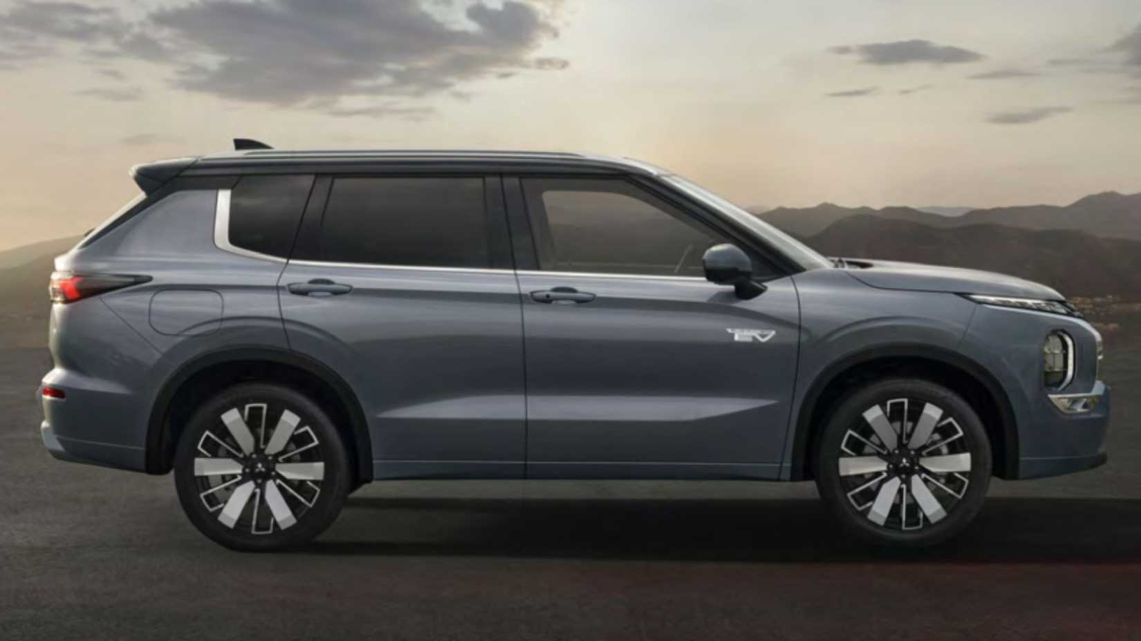 Static side profile photo of a gray 2026 Mitsubishi Outlander PHEV.