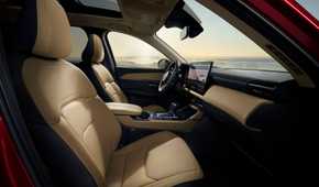 Shot of the front seats and dashboard inside the cabin of a 2026 Mazda CX-5.