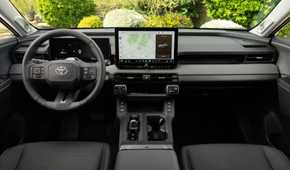 Shot of the dashboard inside the cabin of a 2026 Toyota RAV4 HEV Limited.