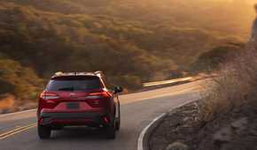 Rear action shot of a 2026 Toyota Corolla Cross