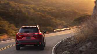 Rear action shot of a 2026 Toyota Corolla Cross