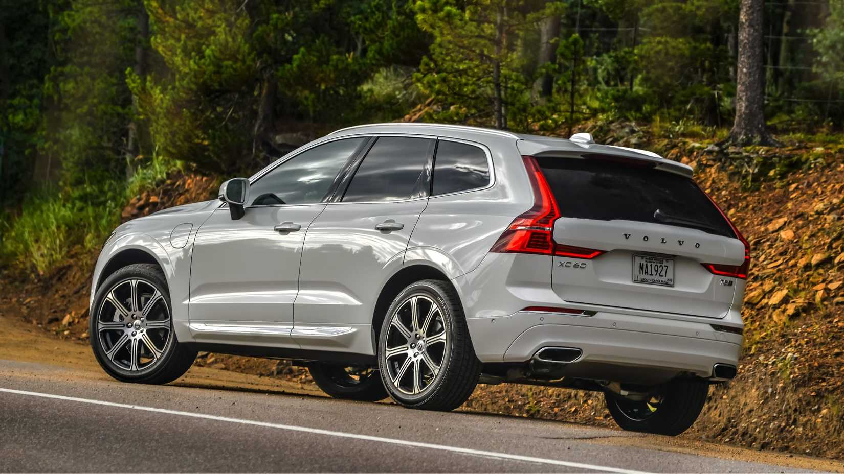 Static rear 3/4 shot of a gray 2017 Volvo XC60 T8 Inscription.