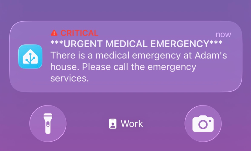A critical notification on a phone stating that there is a medical emergency and asking the recipient to call emergency services.
