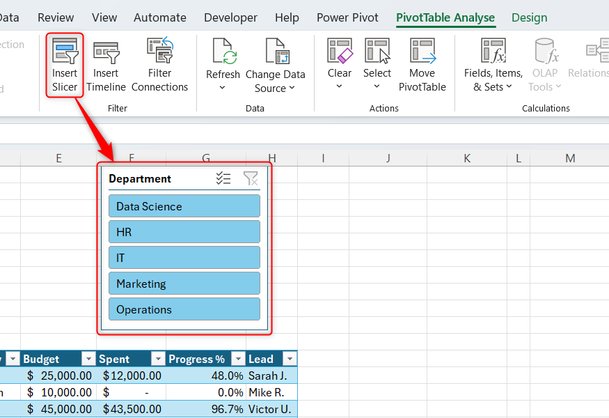 A Department Slicer is inserted into an Excel spreadsheet via the Insert Slicer button in the PivotTable Analyze tab.