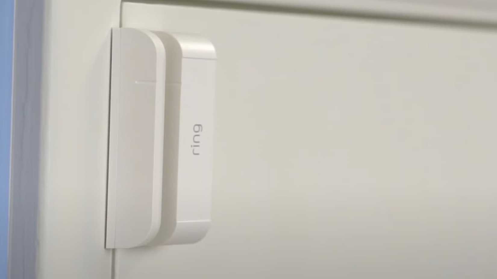A ring contact sensor installed on a door.