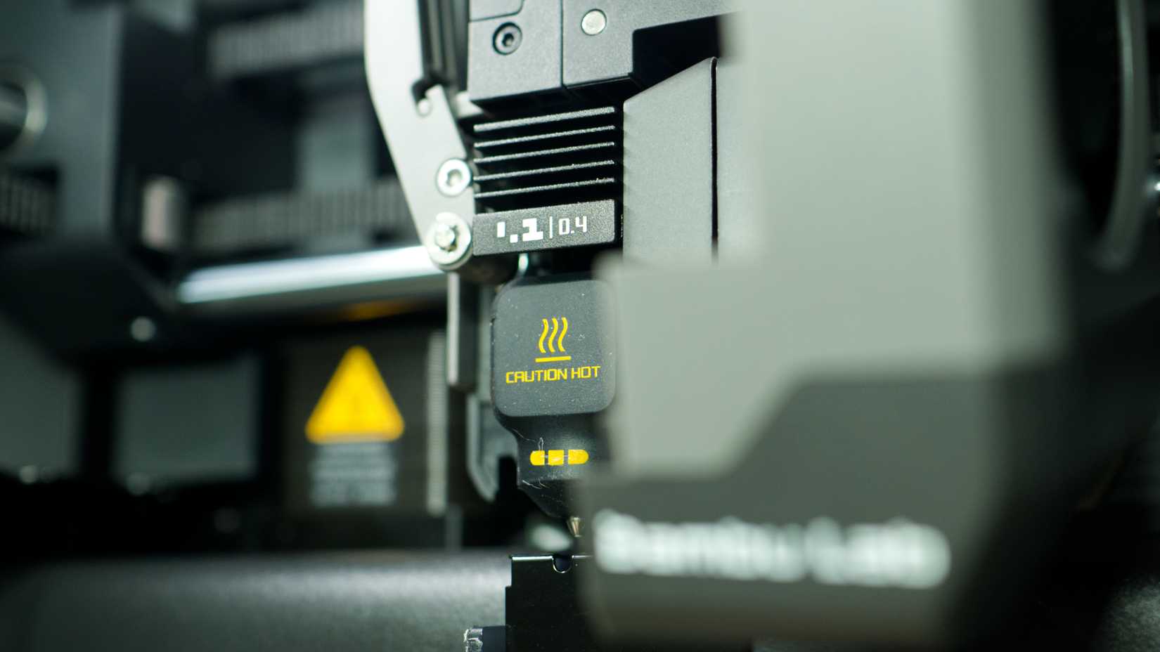 Bambu Lab P2S print head with 0.4mm nozzle on display.