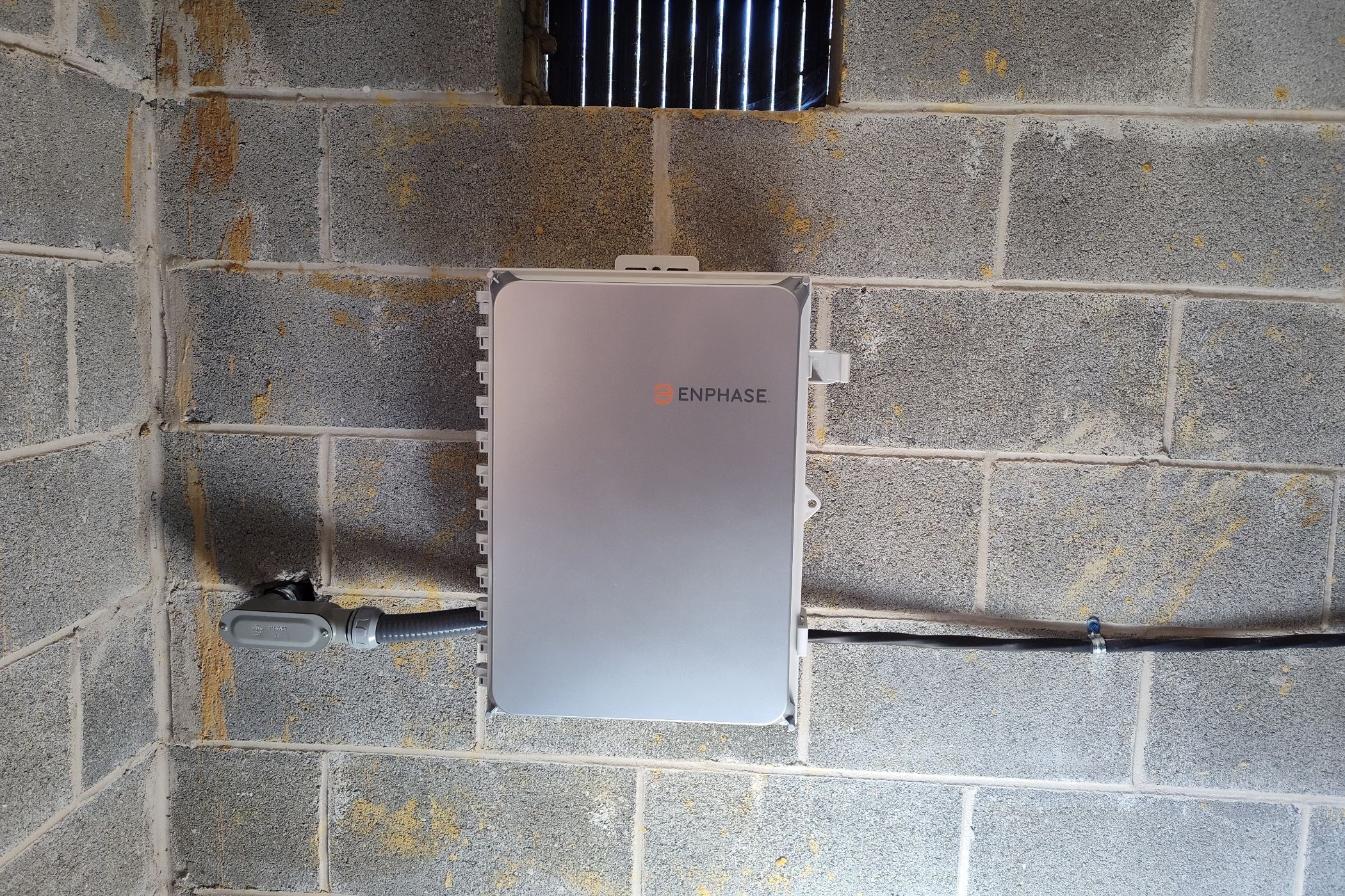 Enphase system controller with conduit running to solar panels.