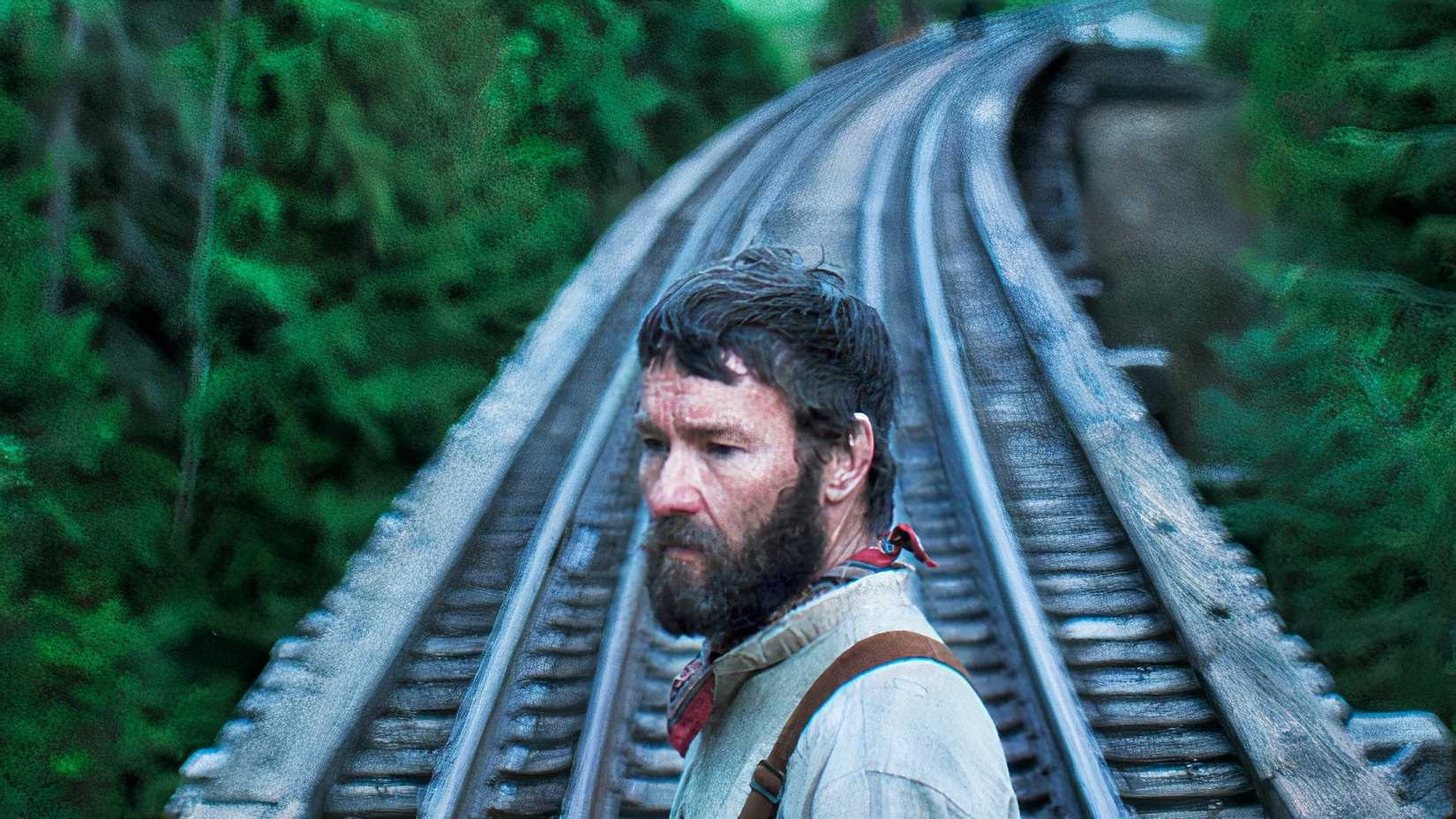 Joel Egerton on the tracks in Train Dreams.