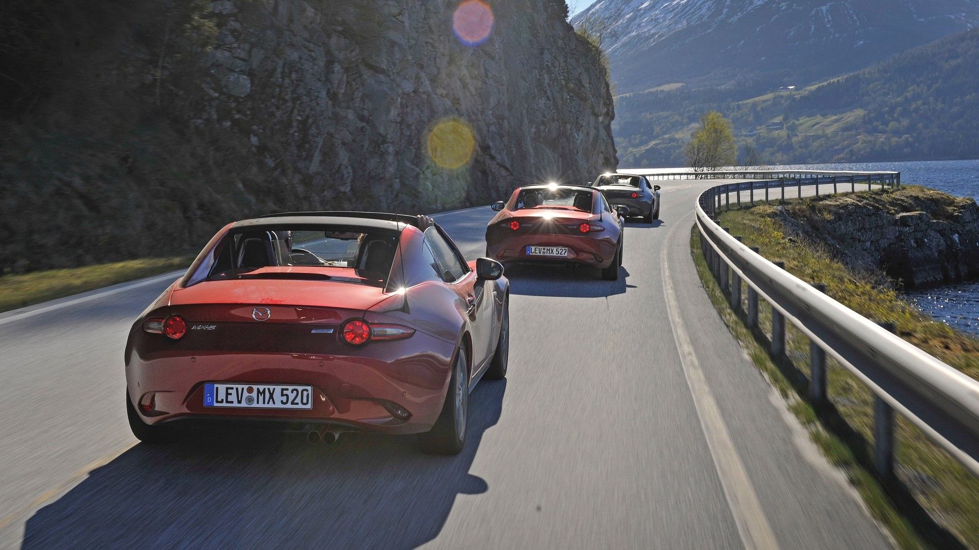 Rear 3/4 shot of three 2017 Mazda MX-5s