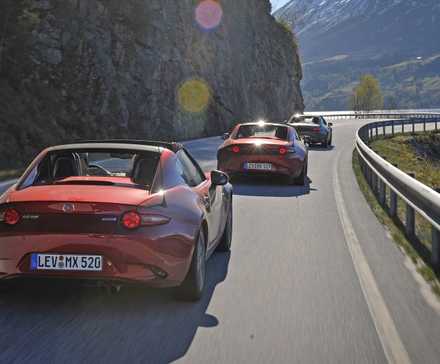 Rear 3/4 shot of three 2017 Mazda MX-5s