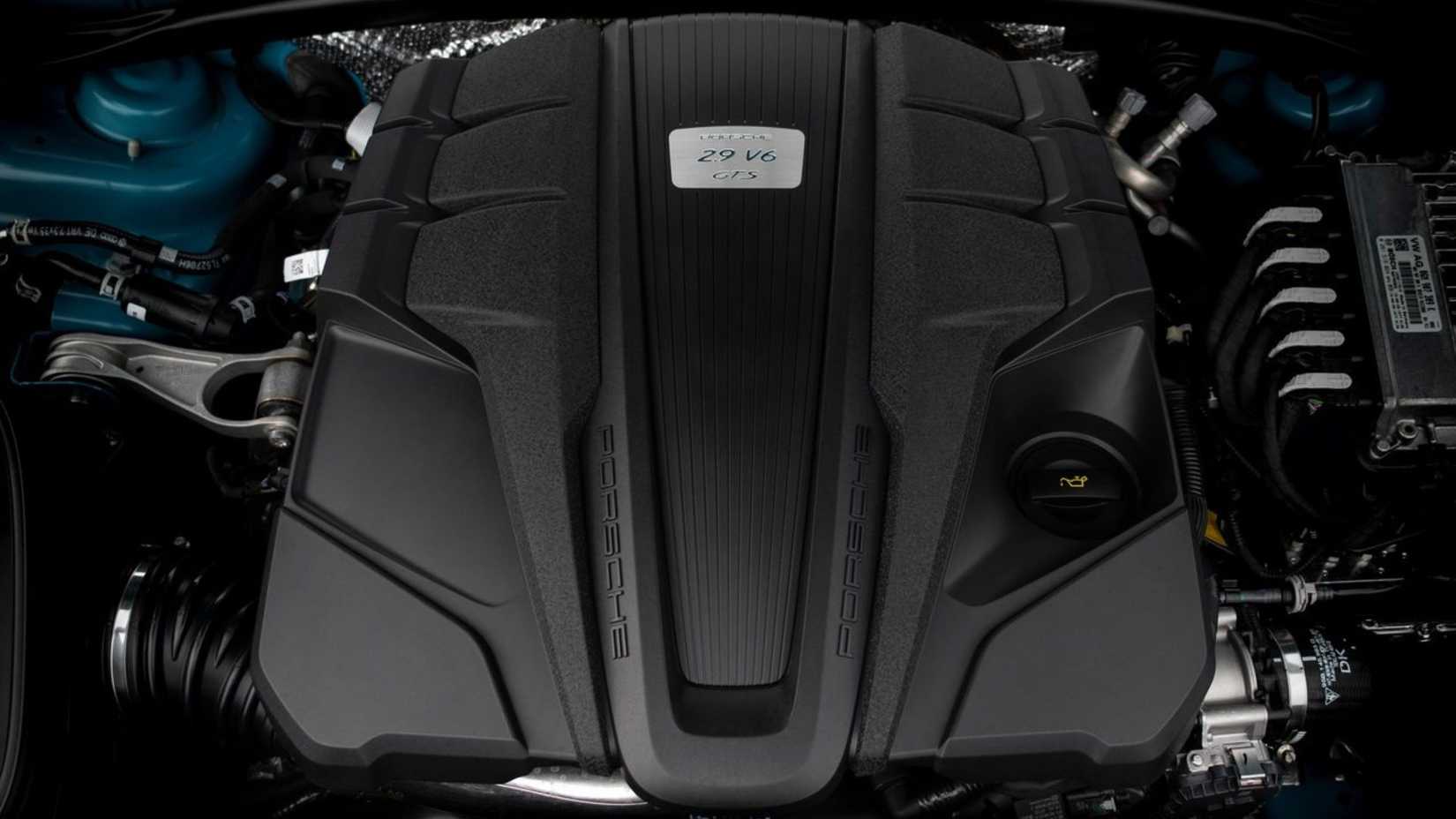 Close-up shot of the 2.9-liter V-6 engine under the hood of a 2020 Porsche Macan GTS.