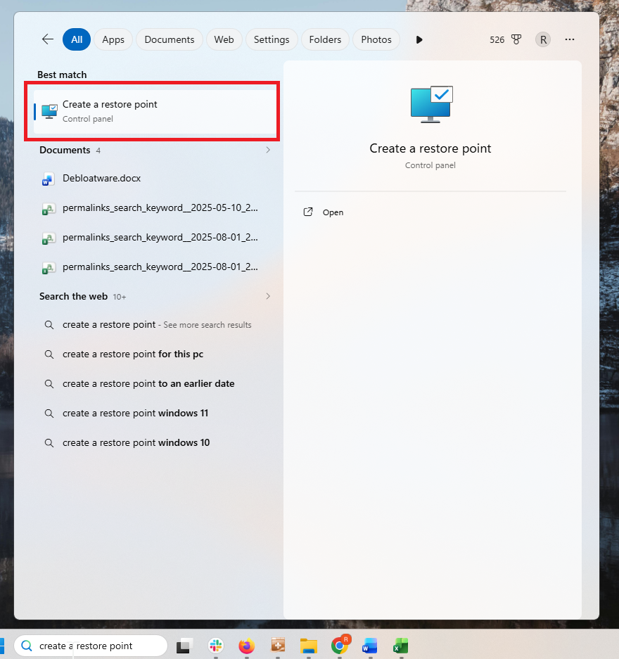 A screenshot of Windows 11 search open to the Windows Recovery settings, Create a restore point highlighted with a red box