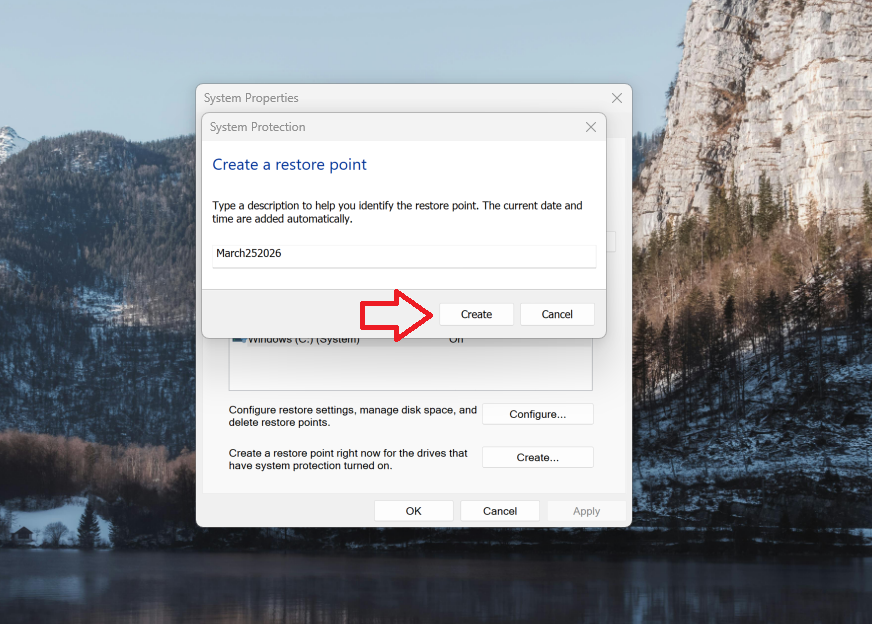 A screenshot of Windows 11 search open to the Windows Recovery settings, the Create a Restore point dialog is open and their is a red arrow pointing at the Create button.