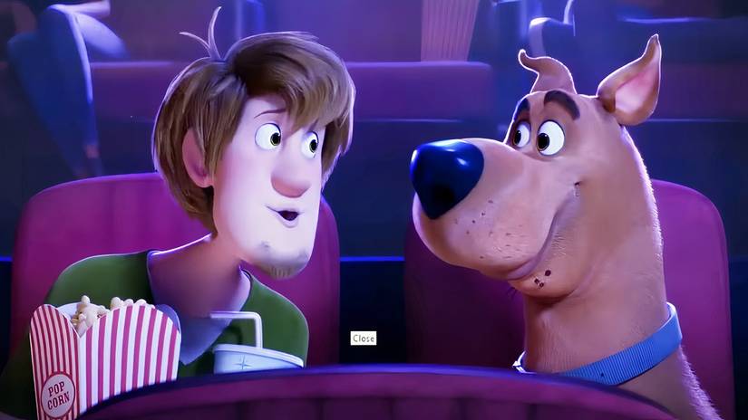 Shaggy and Scooby in the film Scoob!, eating popcorn.