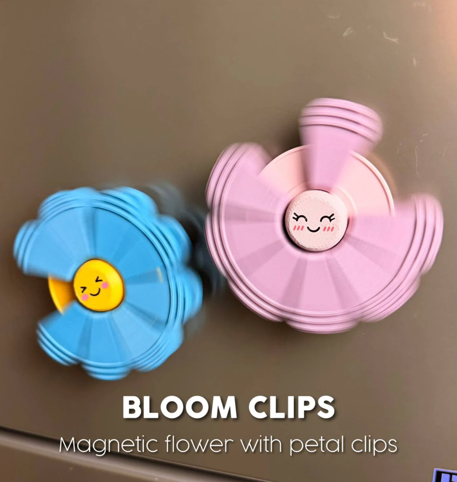 3D printed bloom clips magnetized to a fridge.