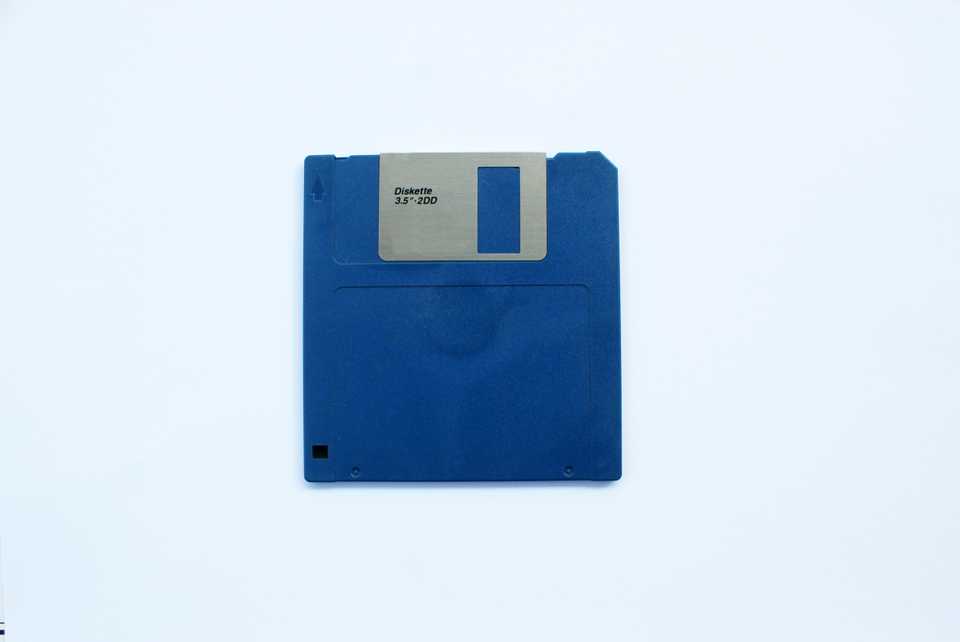 A double density blue floppy disk.