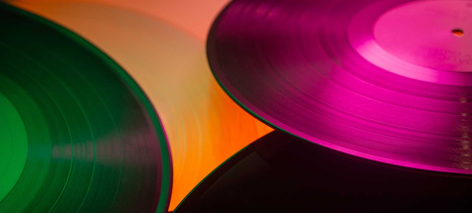 Several colored vinyl records.