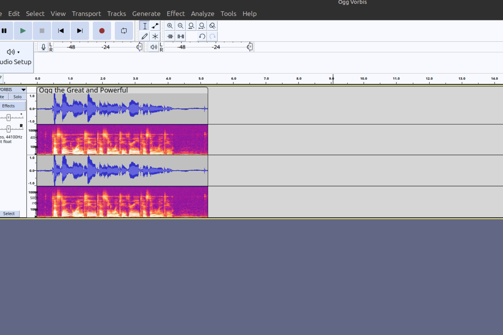 A blue wave form and orange spectrograph, open in Audacity, shows the words "Ogg the Great and Powerful" displayed above the audio track track