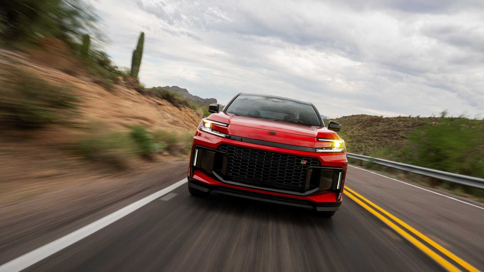Head-on action shot of a 2026 Toyota RAV4 PHEV GR Sport