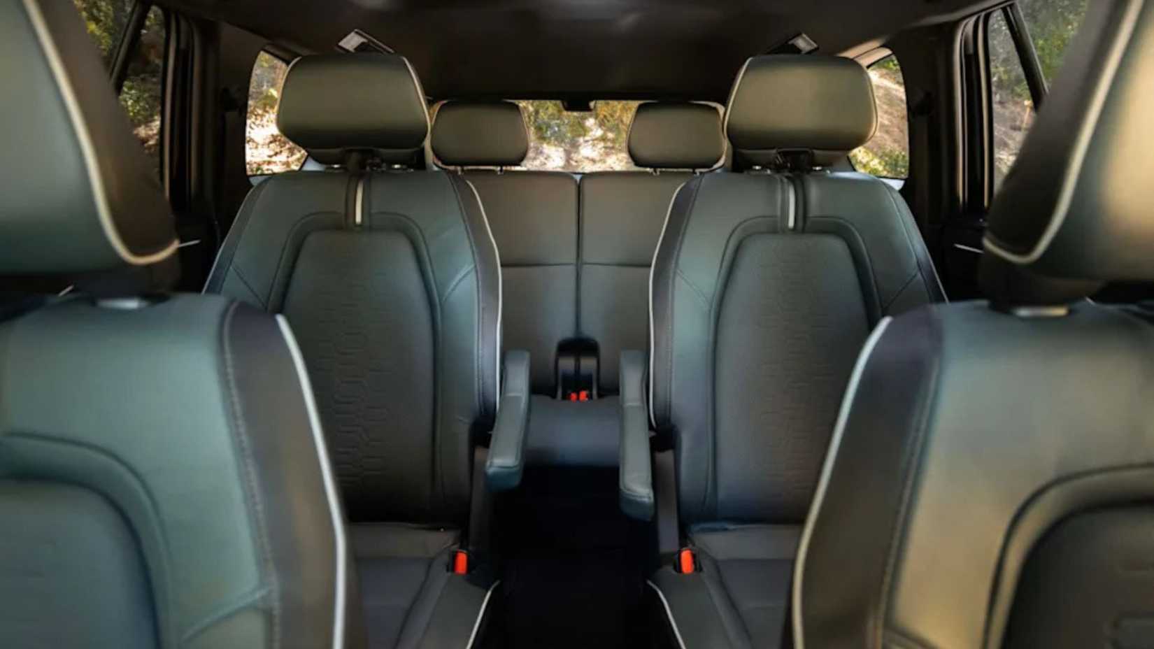 Shot inside the cabin of a 2027 Subaru Getaway, showing its three rows of seating.