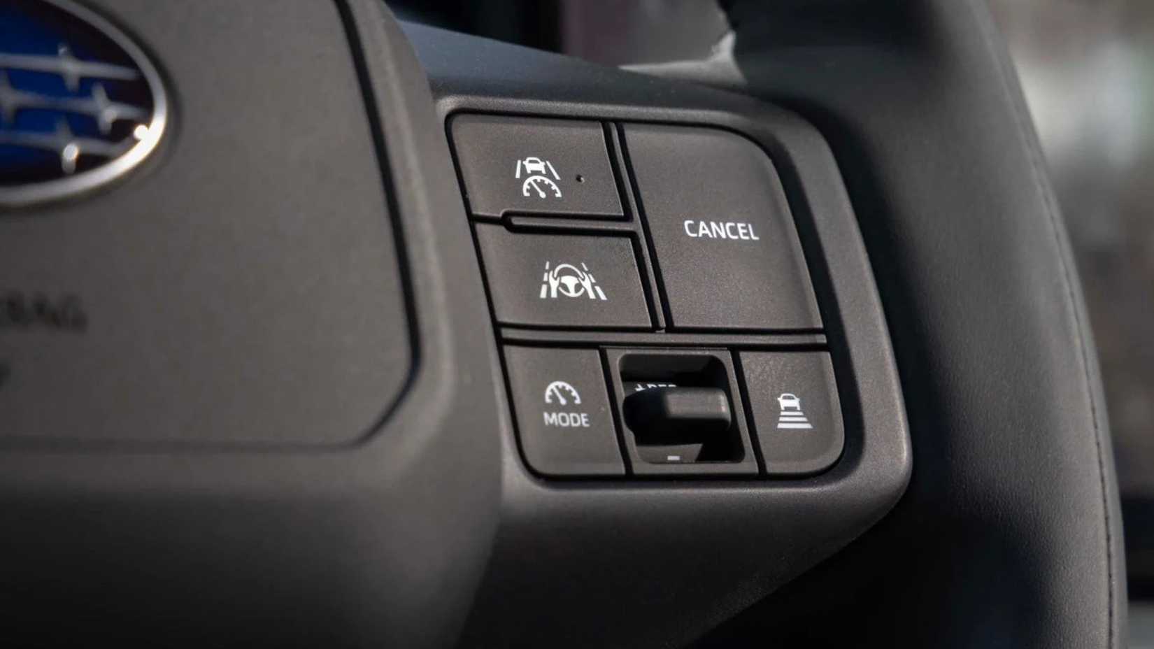 Close-up shot of the steering wheel controls in a 2027 Subaru Getaway.