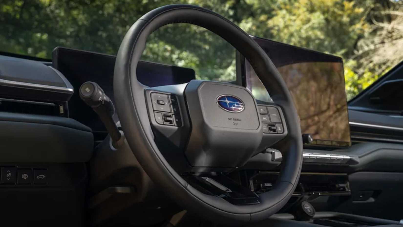 Close-up shot of the steering wheel in a 2027 Subaru Getaway.