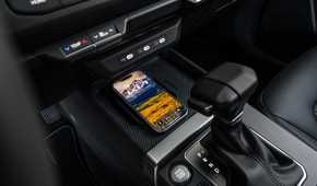 Close up of the smartphone charging pad in a 2027 Kia Seltos
