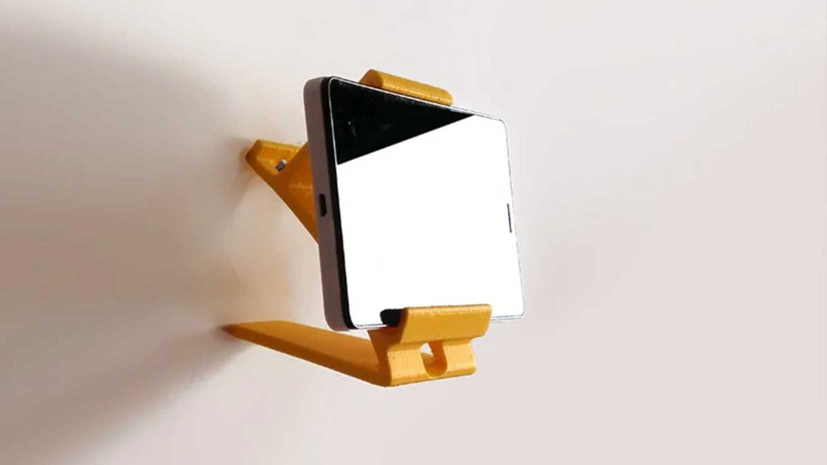 A wall stand for a phone