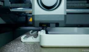 Bambu Lab P2S 3D printer mid-print.