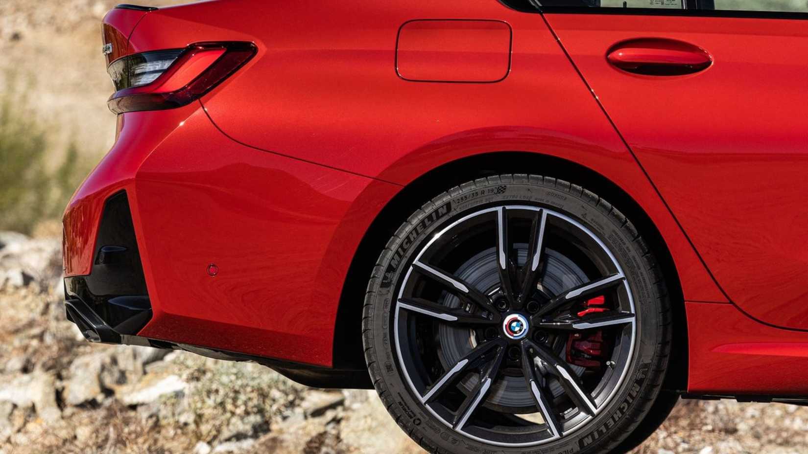 Close-up shot of the rear 1/4 of a red 2023 BMW M340i.