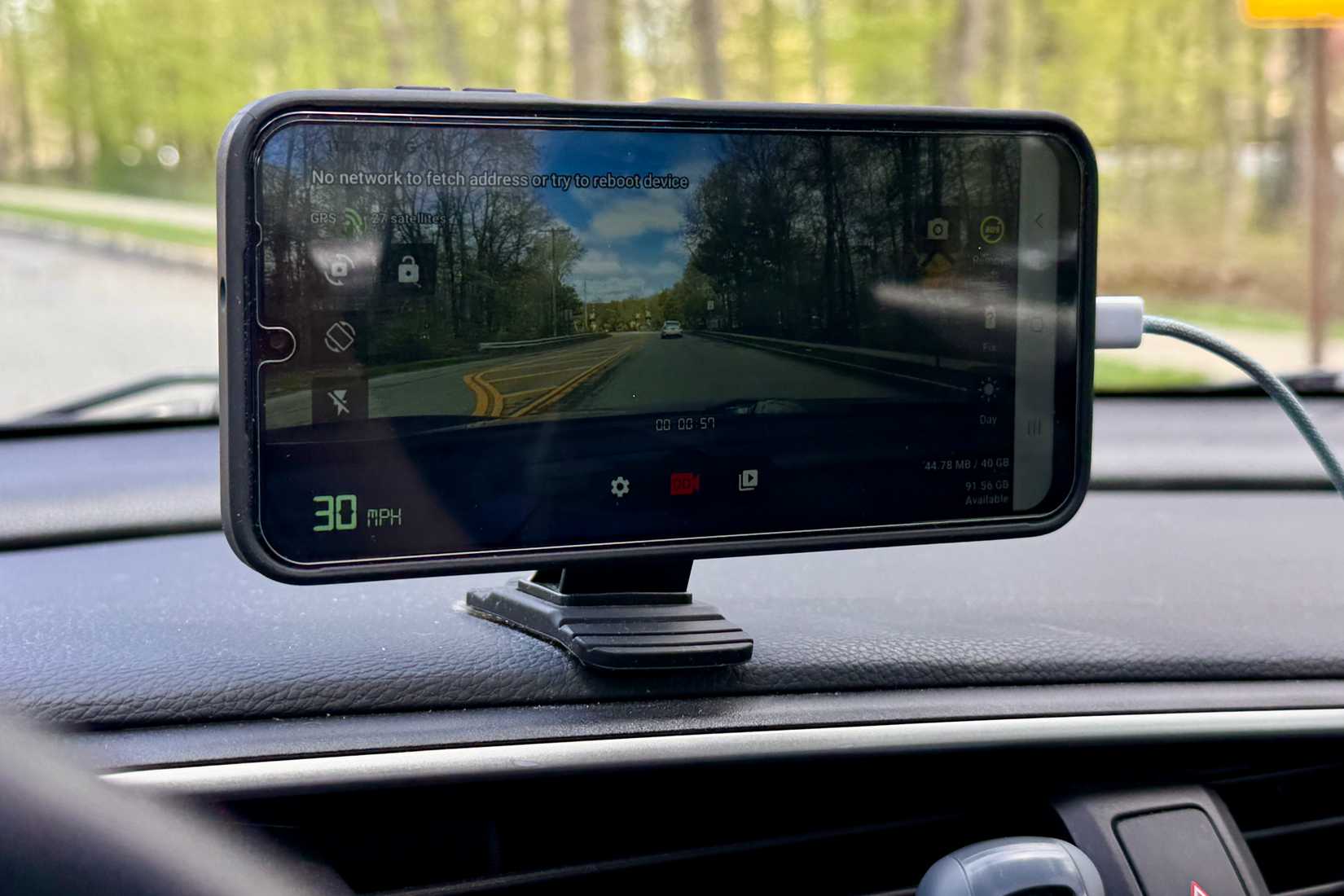 Speed on dash cam app on a Samsung device in a car.
