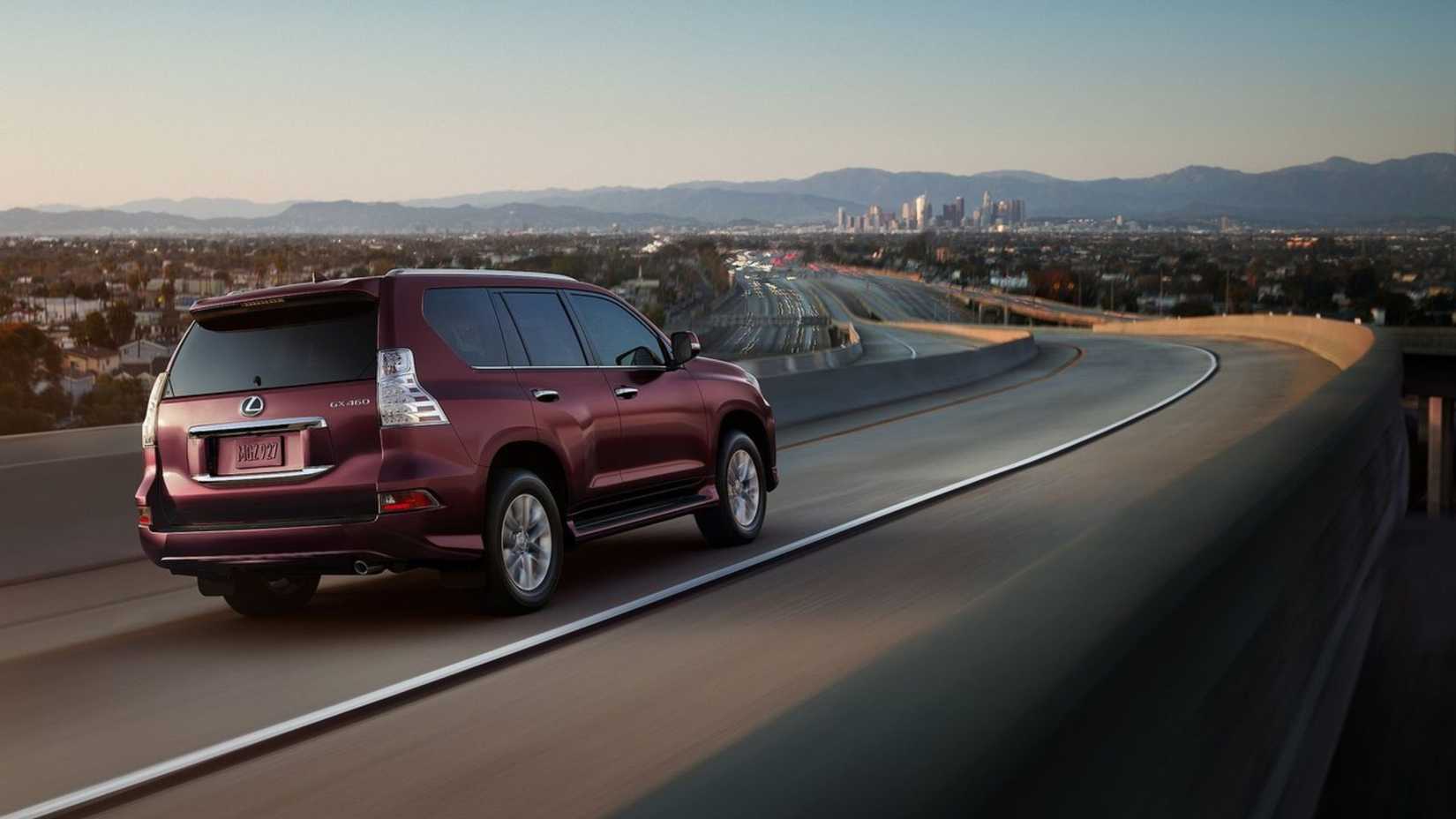 Dynamic rear 3/4 shot of a red 2020 Lexus GX 460.