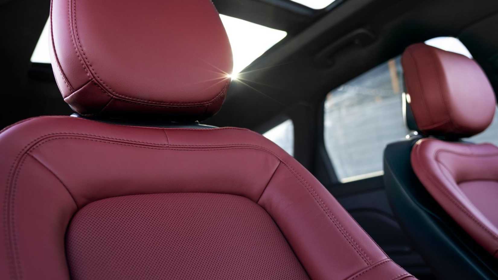 Close-up shot of the red leather interior inside the cabin of a 2023 Lincoln Corsair.