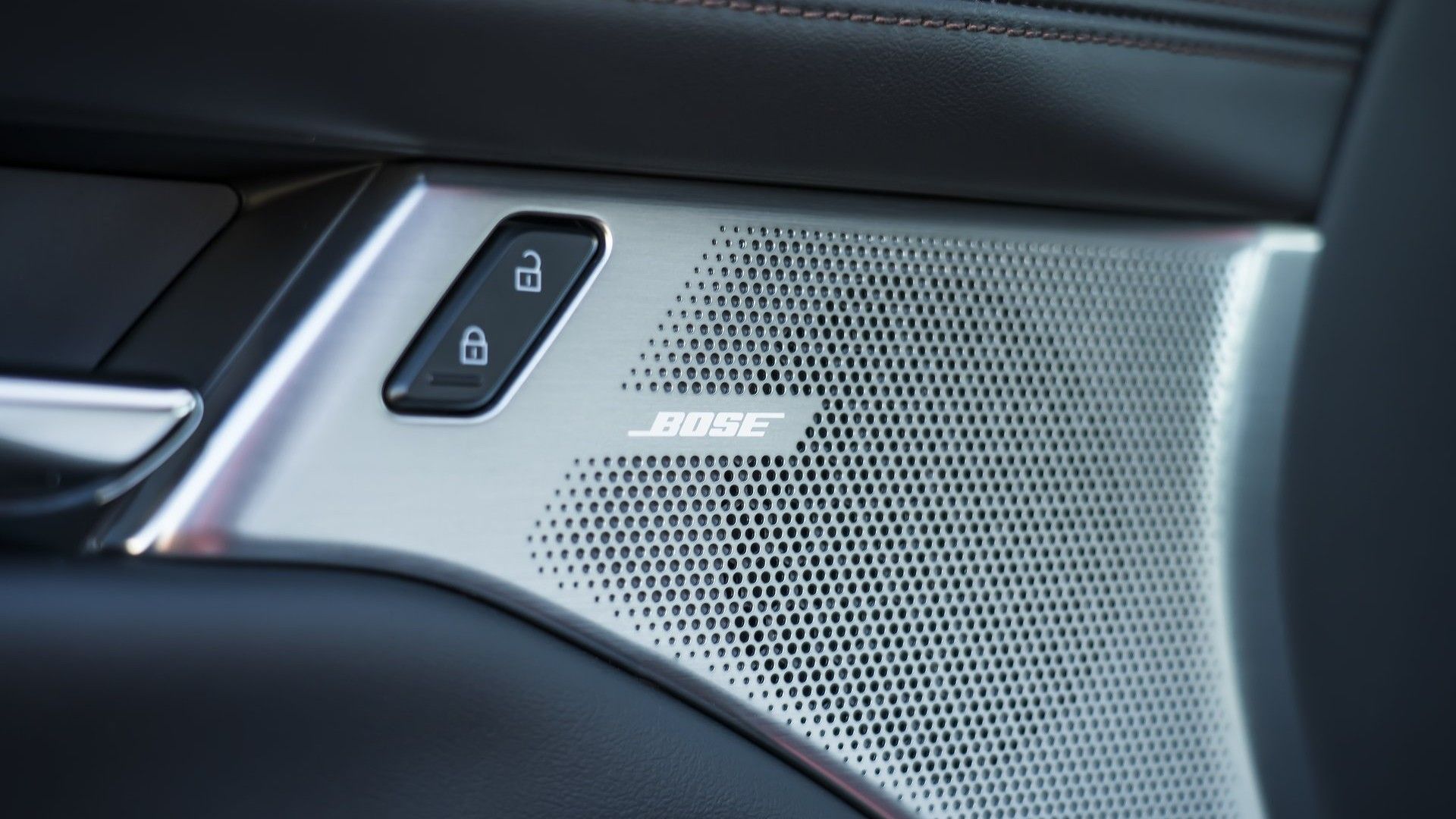 Close of of a Bose speaker in the door of a 2019 Mazda 3