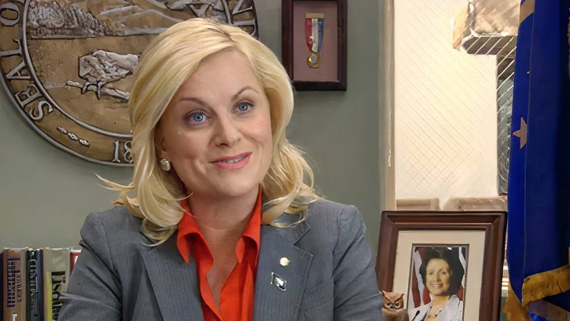 Amy Poehler in Parks and Recreation speaking to a camera