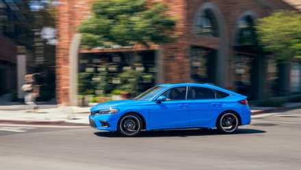 The lush compact SUV consumers are switching to as a substitute of the RAV4 in 2026 Side profile action shot of a 2025 Honda Civic Hatchback