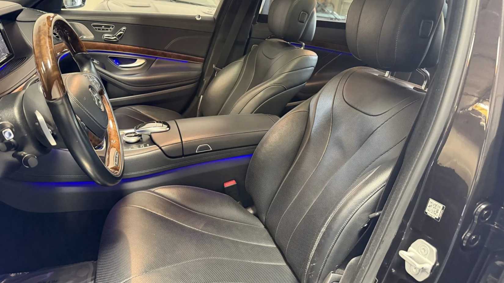 Shot of the front seats inside the cabin of a 2015 Mercedes-Benz S550.