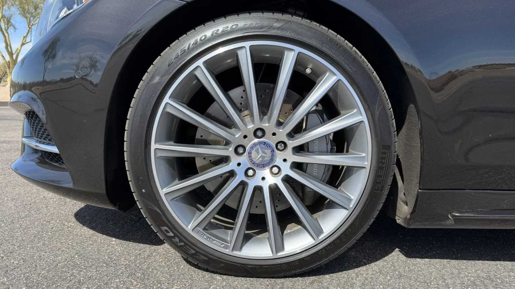 Close-up shot of the alloy wheel on a black 2015 Mercedes-Benz S550.