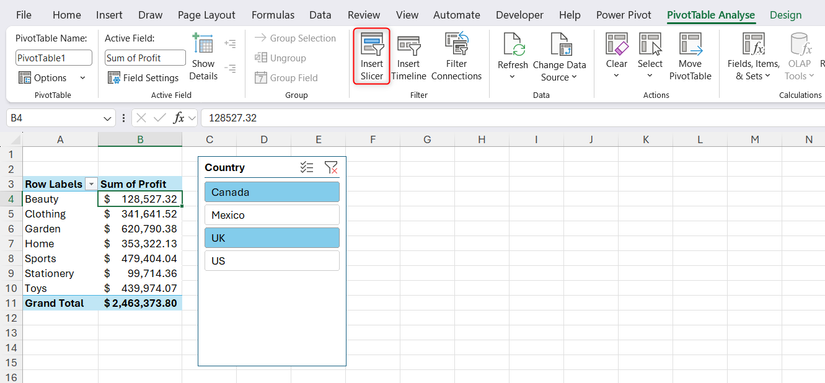 An active PivotTable and slicer on a worksheet with the Insert Slicer button highlighted in the PivotTable Analyze ribbon tab.